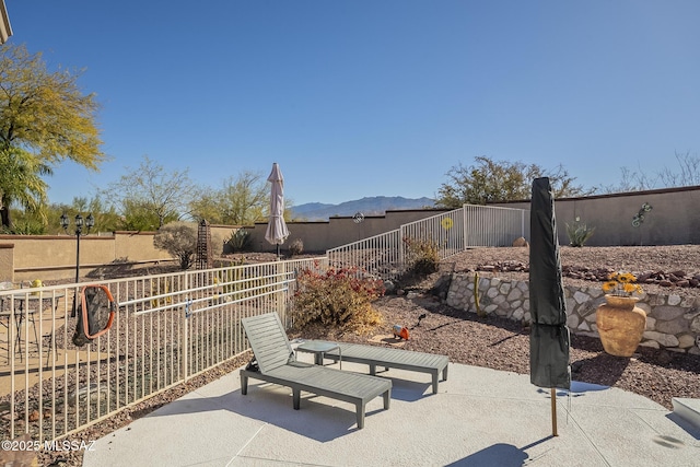 view of patio with a mountain view