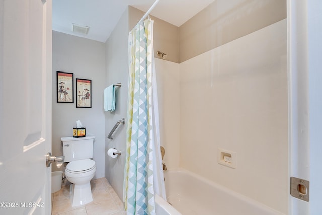 bathroom featuring visible vents, shower / bathtub combination with curtain, toilet, and tile patterned flooring