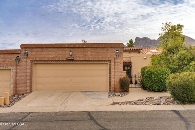 view of front of property with a mountain view