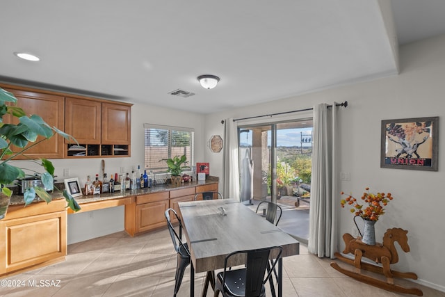 kitchen with light tile patterned floors