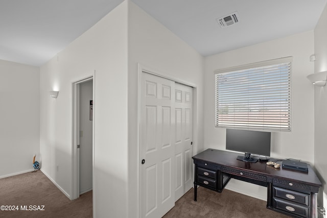 office area featuring dark colored carpet