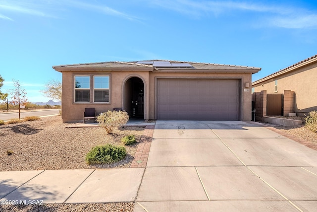 view of front of home with a garage