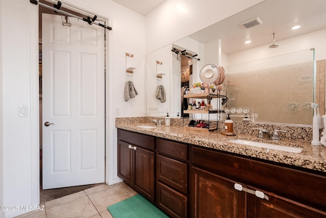 bathroom featuring vanity and tile patterned flooring