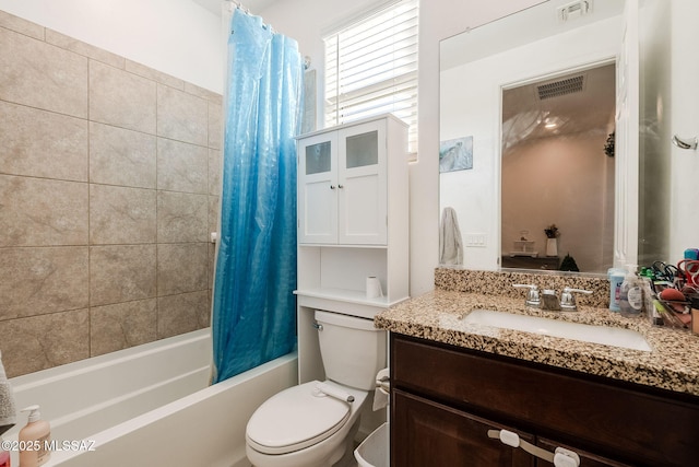 full bathroom featuring vanity, toilet, and shower / bath combo