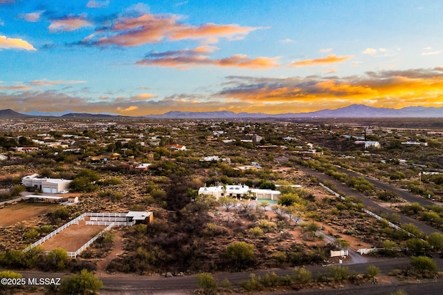 aerial view at dusk with a mountain view