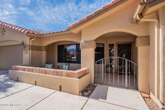 entrance to property with a garage