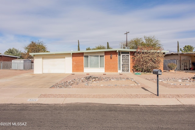 single story home featuring a garage