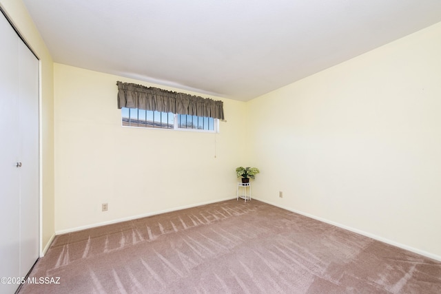 empty room featuring carpet