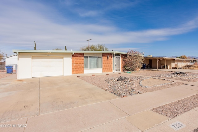 ranch-style home with a garage