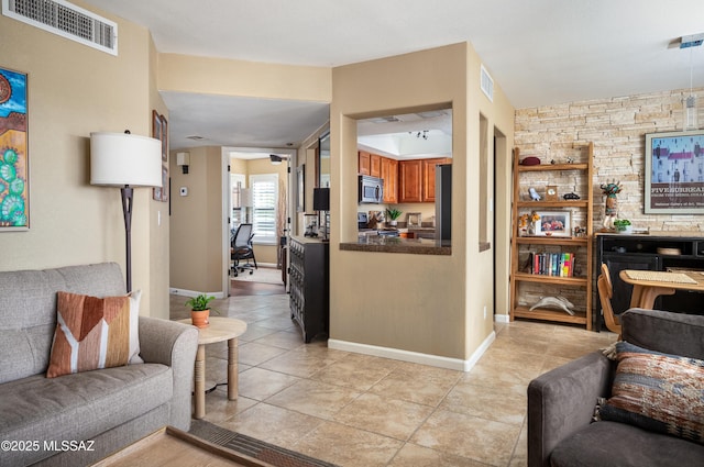 living room featuring light tile patterned floors