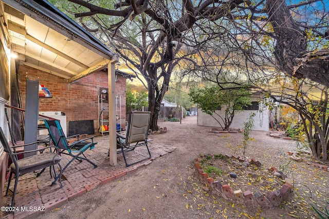 view of yard with a patio and fence