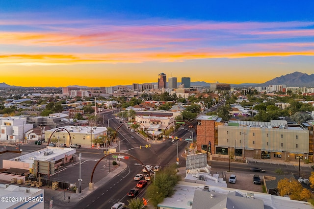 aerial view with a view of city and a mountain view