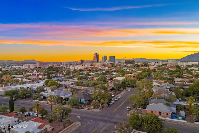 bird's eye view featuring a view of city and a mountain view