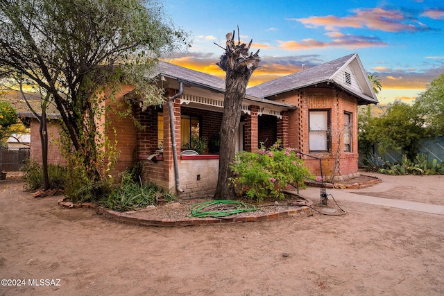 view of front of house with brick siding