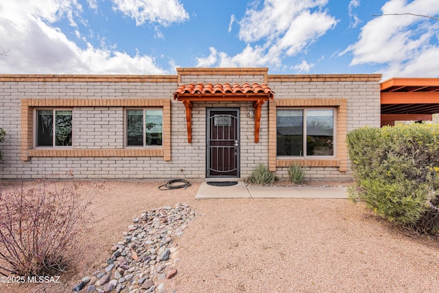 view of front property with brick siding