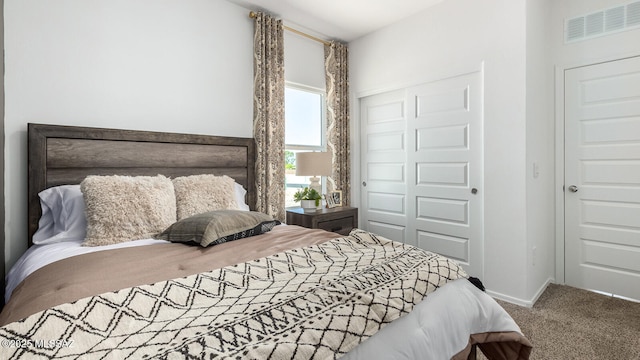 bedroom featuring a closet and carpet