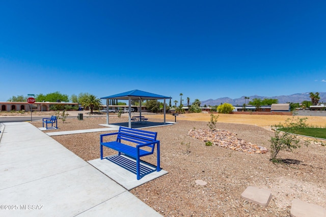 view of property's community featuring a gazebo and a mountain view