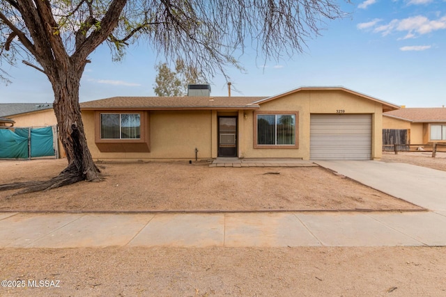 ranch-style house with a garage