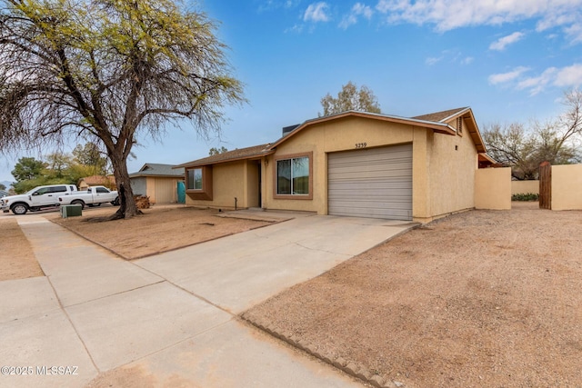 ranch-style home with a garage