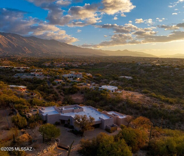 aerial view at dusk with a mountain view