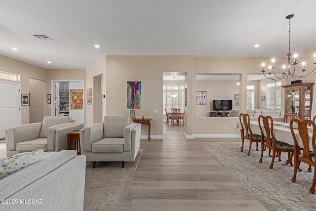 dining space featuring recessed lighting, baseboards, visible vents, and light wood finished floors