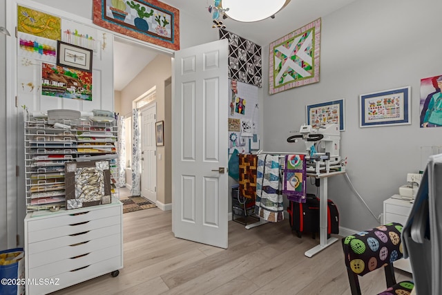 interior space with light wood-style floors and baseboards