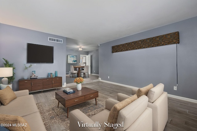 living room with dark wood-type flooring