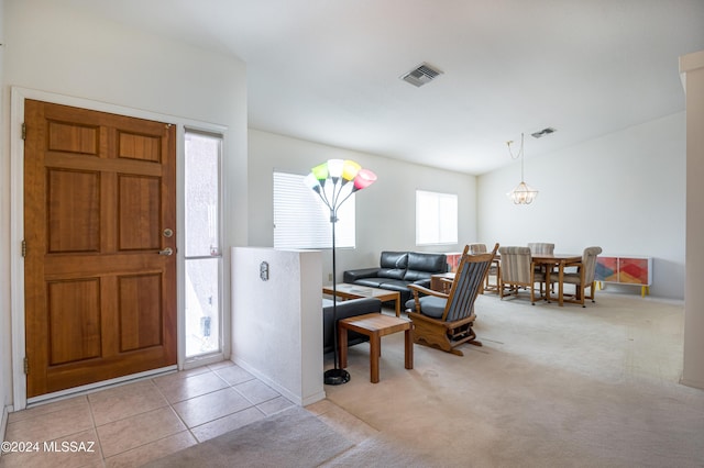 entrance foyer featuring light tile patterned floors