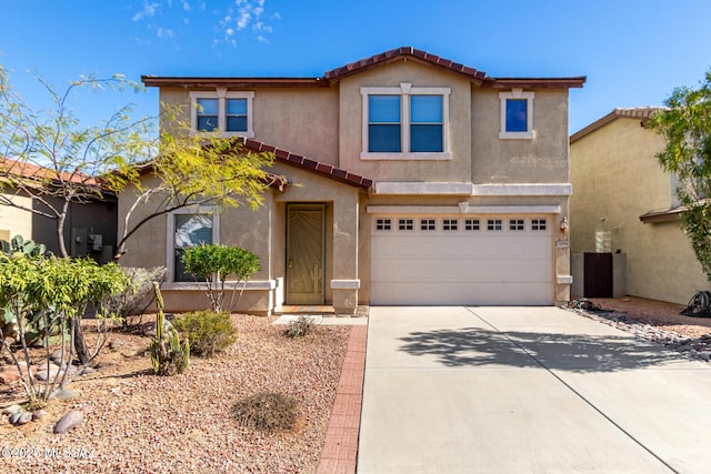 12996 N Desert Olive Dr, Oro Valley, AZ 85755 - view of front of property with a garage
