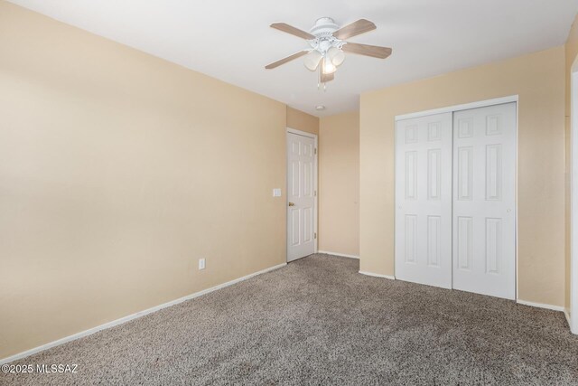 12996 N Desert Olive Dr, Oro Valley, AZ 85755 - unfurnished bedroom with carpet, ceiling fan, and a closet