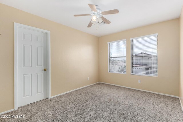 12996 N Desert Olive Dr, Oro Valley, AZ 85755 - unfurnished room featuring carpet flooring and ceiling fan