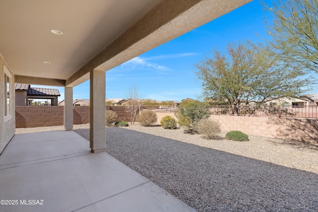 view of patio featuring a fenced backyard