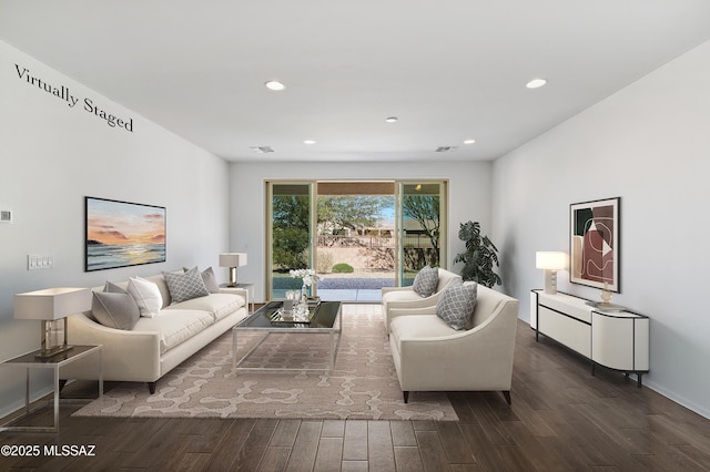 living room with recessed lighting, baseboards, and dark wood-style floors