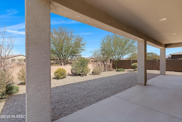 view of patio with a fenced backyard