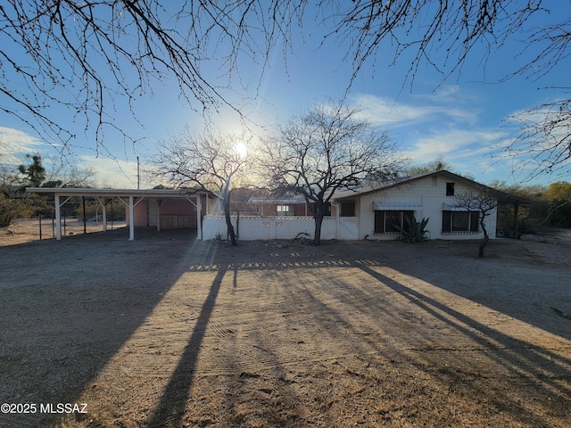 view of front of house with a carport