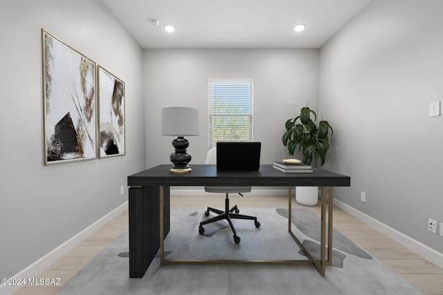 office space featuring light hardwood / wood-style floors