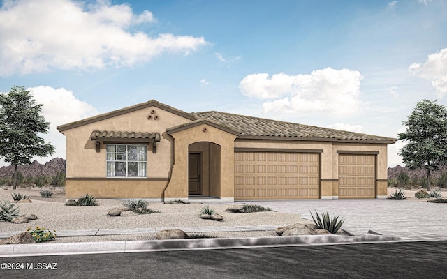 mediterranean / spanish-style home featuring a garage