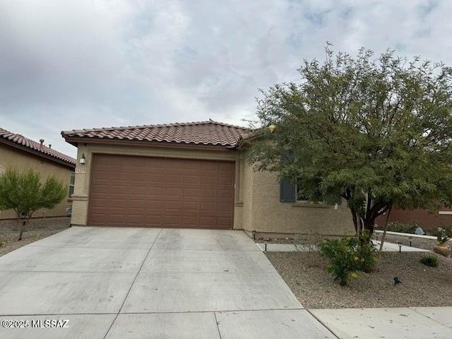 view of front of home with a garage