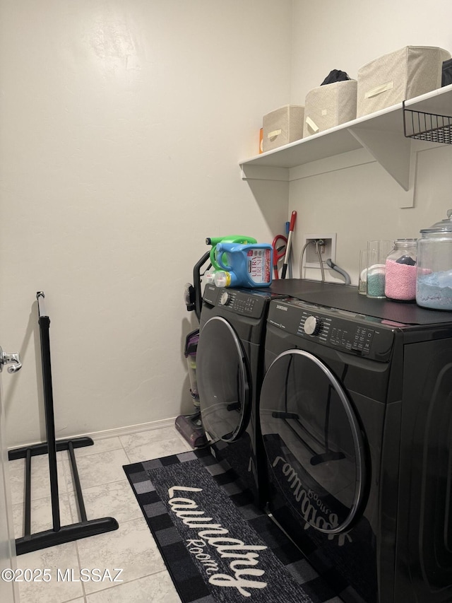 washroom with washer and clothes dryer