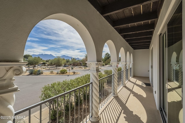 balcony featuring a mountain view