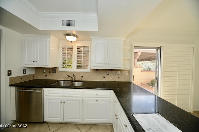 kitchen featuring sink, crown molding, dishwasher, dark stone counters, and white cabinets