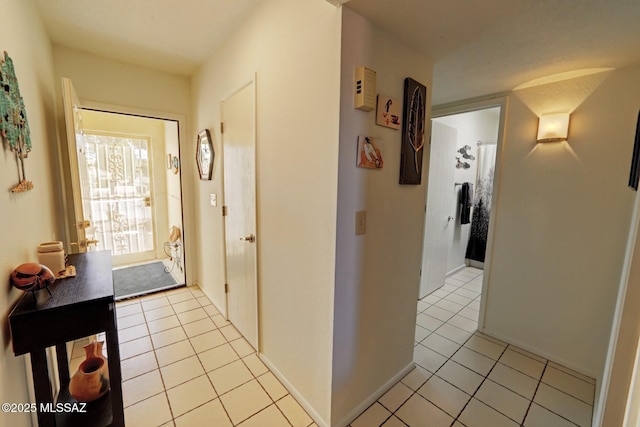 interior space with light tile patterned floors