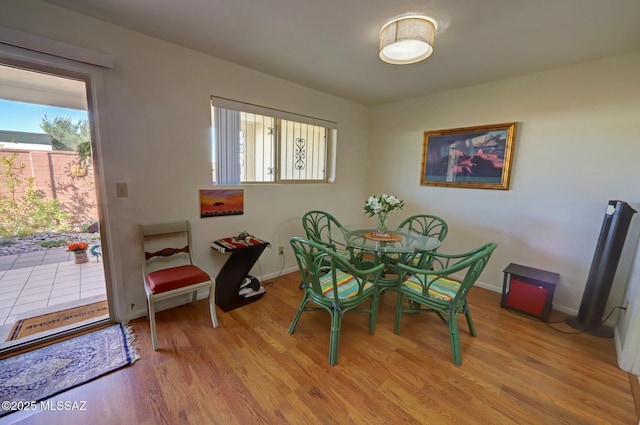 dining room featuring light hardwood / wood-style flooring