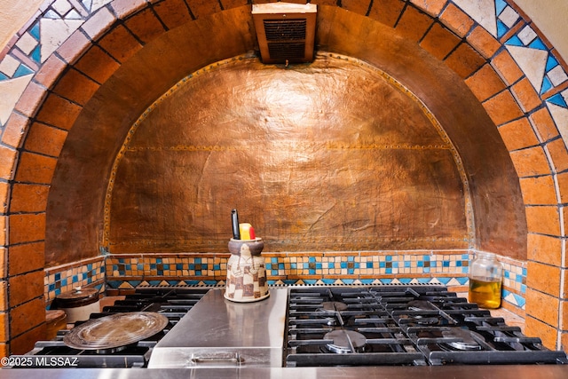 interior details with arched walkways and decorative backsplash