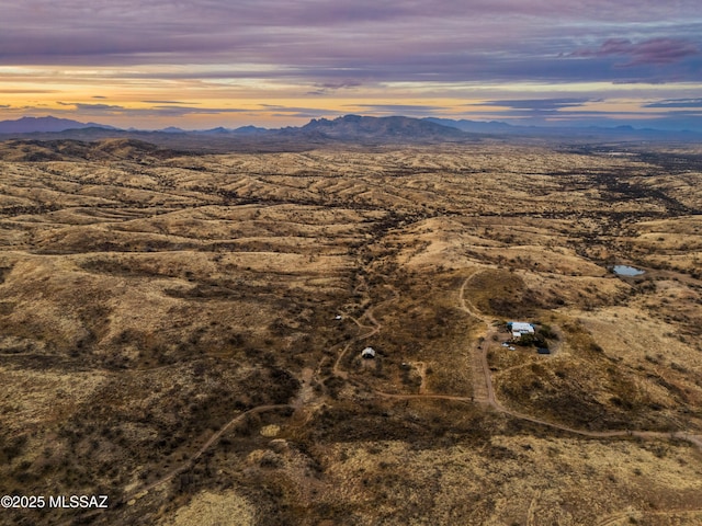 aerial view at dusk with a mountain view