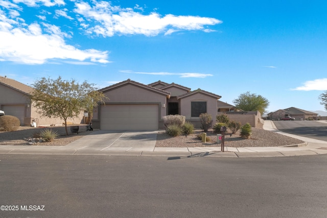 view of front of property with a garage