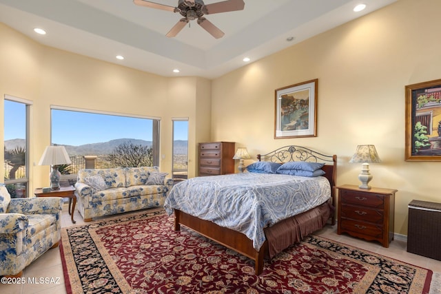 bedroom with recessed lighting, light tile patterned flooring, a mountain view, and ceiling fan