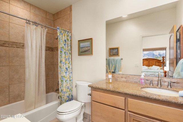 bathroom with toilet, ensuite bath, shower / bath combo, and vanity