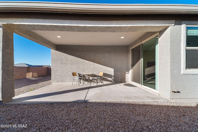 view of patio with fence