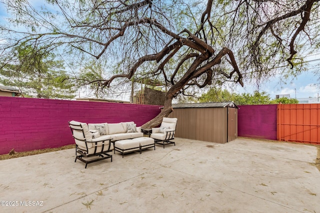 view of patio with a storage unit and an outdoor hangout area